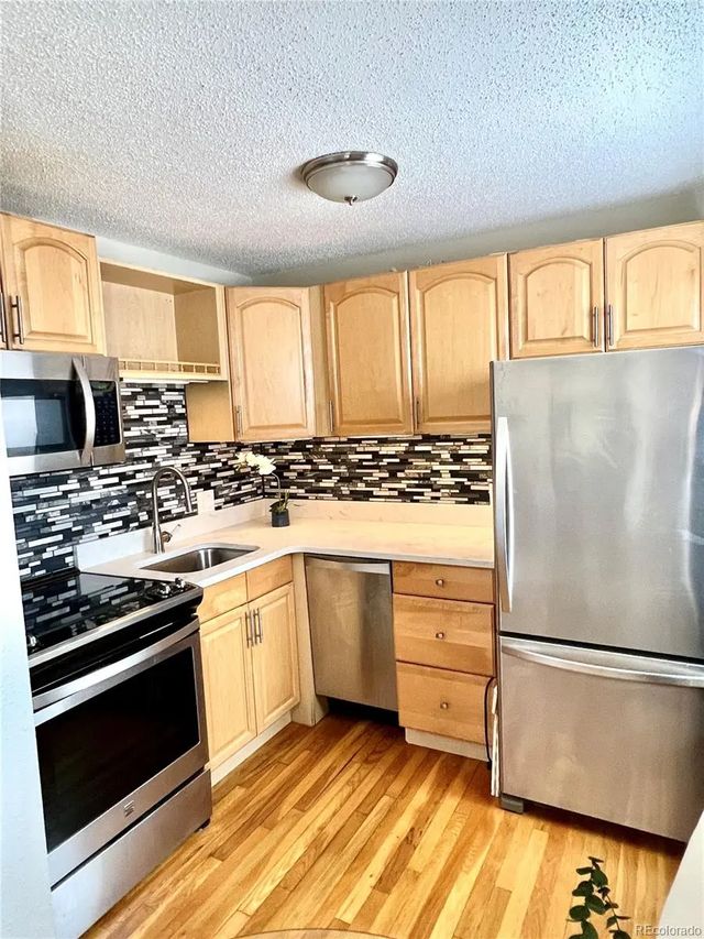 2480 W Caithness Place 8, Denver