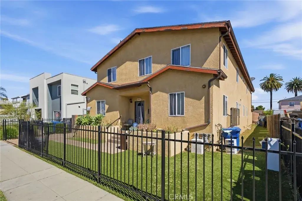 1409-- 1411 W 84th Place, Los Angeles