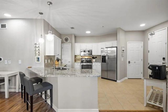 301 Terrace Ridge Circle 301, DAVENPORT
