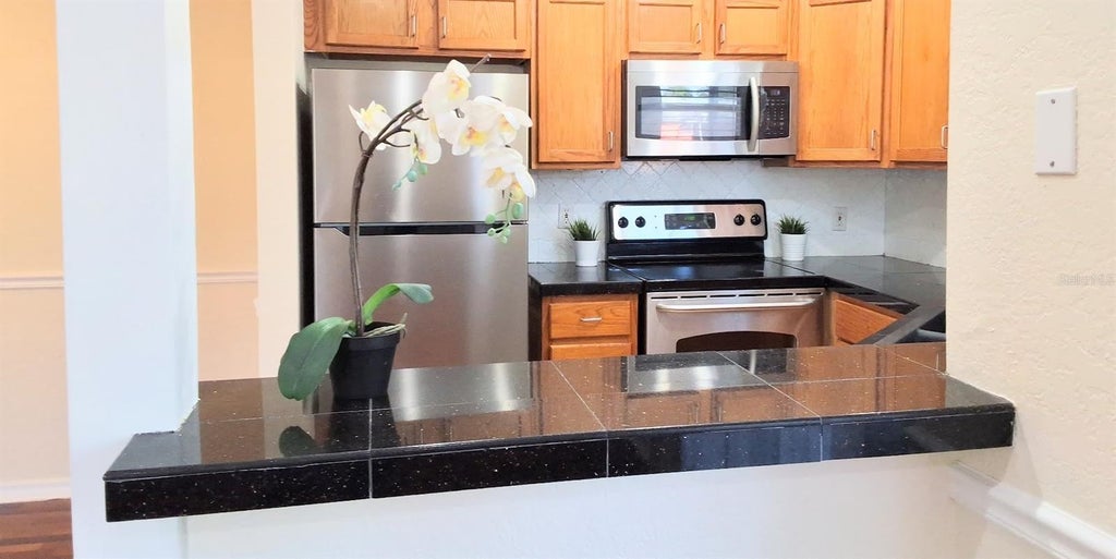 2905 Antique Oaks Circle 6, WINTER PARK