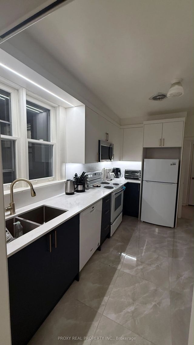 211 Newton Drive, Toronto C14