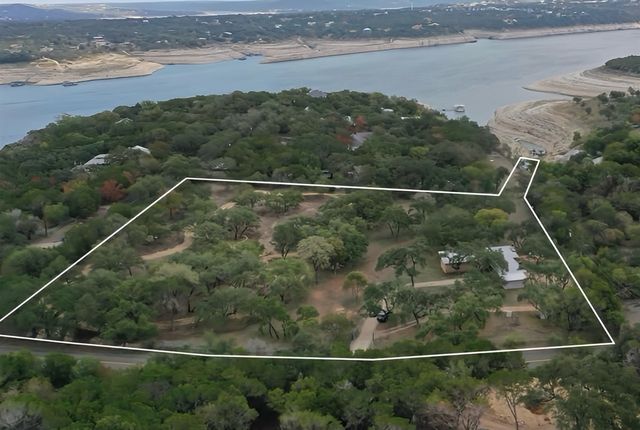 MLS #1039588 for Sale at 17416 Sleepy Hollow Dr, on Lake Travis in the city of Lago Vista, 78645