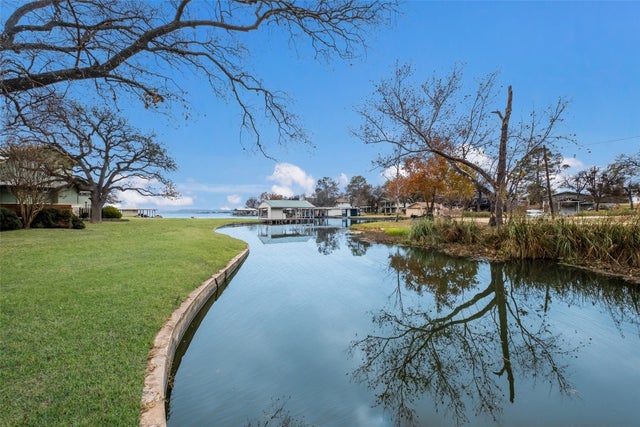 MLS #4151400 for Sale at 409 S Timberhill Dr, on Lake LBJ in the city of Granite Shoals, 78654