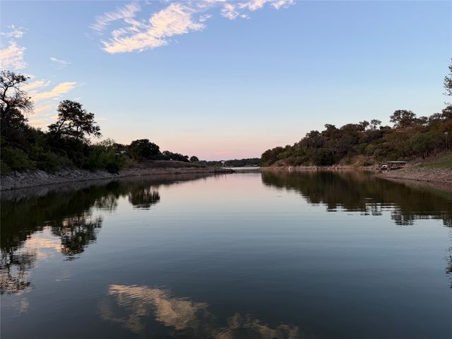 MLS Number 6882278 on Lake Travis in the city of Spicewood Homes for Sale by Rivercliff Sec 2 Phs A, the zipcode of 78669