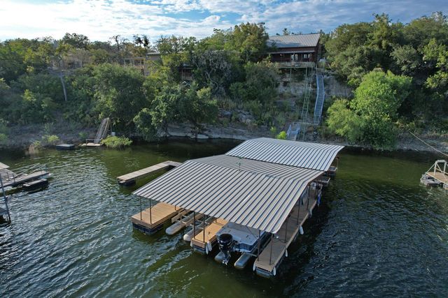 MLS Number 9256963 on Lake Travis in the city of Spicewood Homes for Sale by Cat Hollow, the zipcode of 78669