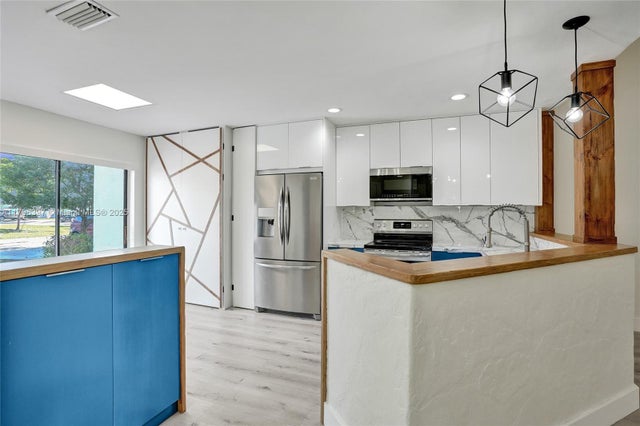3 of 40 - 155 Love Cres 155, Royal Palm Beach, FL