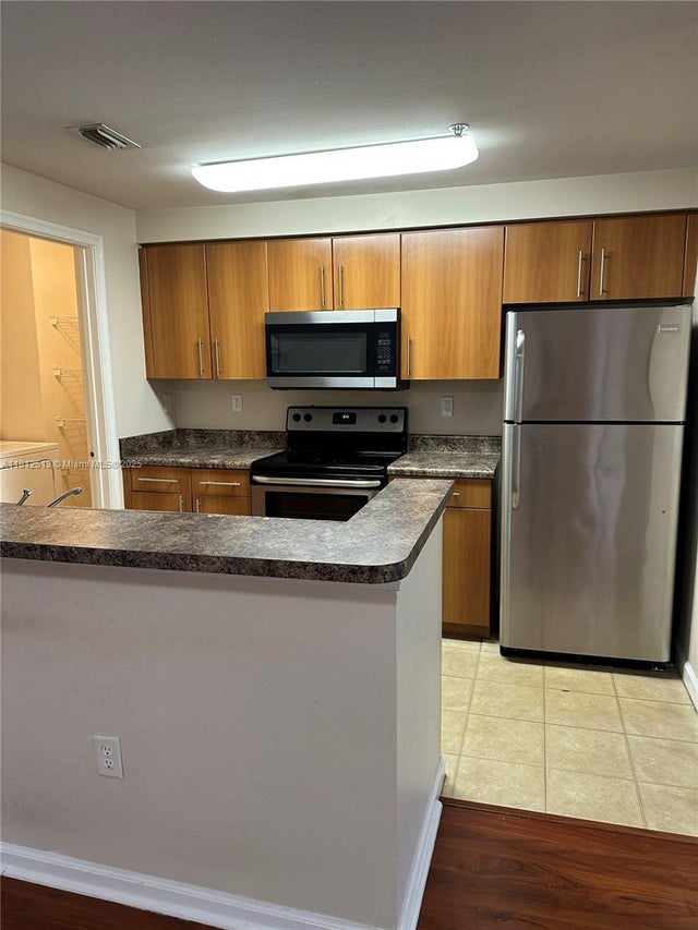 1 of 20 - 5840 W Sample Rd 306, Coral Springs, FL