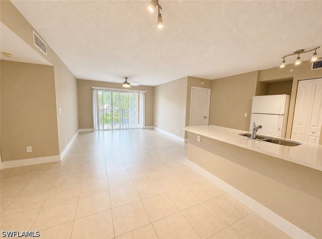 1205 Wildwood Lakes Blvd 203, Naples