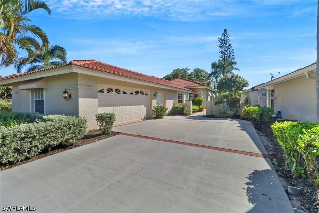11745 Quail Village Way, Naples