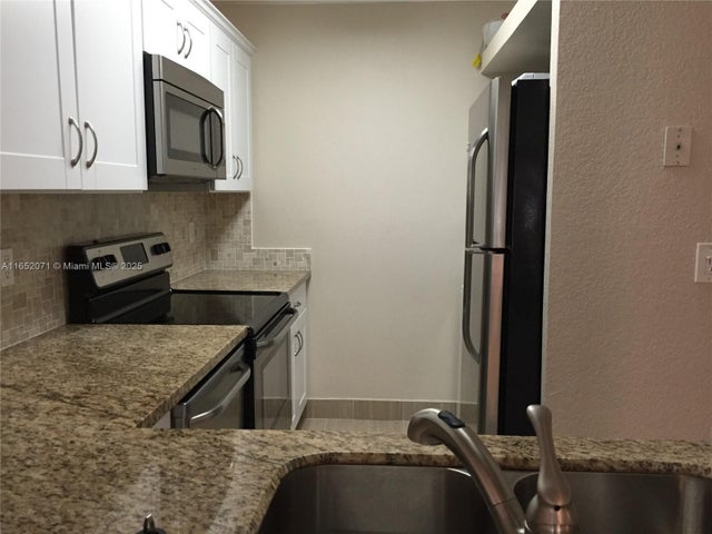 2 of 9 - 1028 Twin Lakes Dr 21-c, Coral Springs, FL