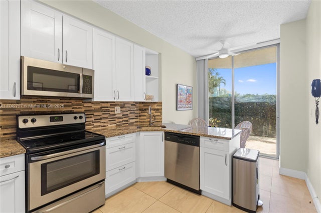 2 of 56 - 3530 Mystic Pointe Dr 102, Aventura, FL