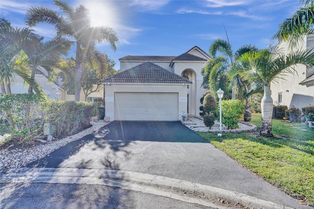 7698 Hibiscus Ln, Coral Springs