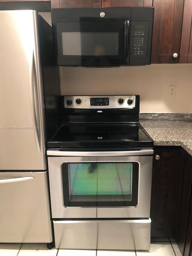 1 of 14 - 494 Nw 165th St Rd C-102, Miami, FL