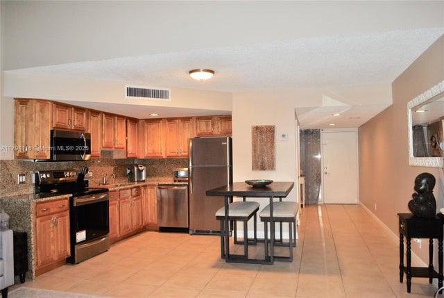 1 of 10 - 49 Deer Creek Rd E105, Deerfield Beach, FL