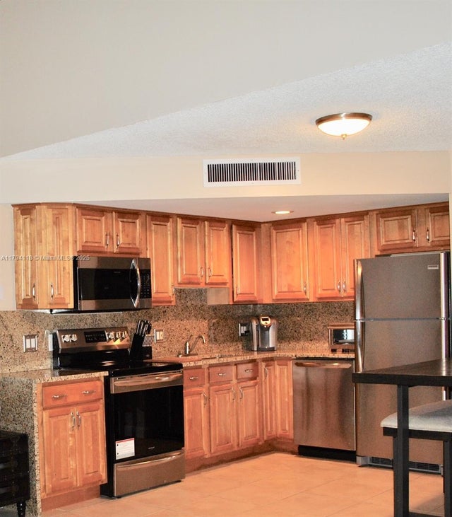 2 of 10 - 49 Deer Creek Rd E105, Deerfield Beach, FL