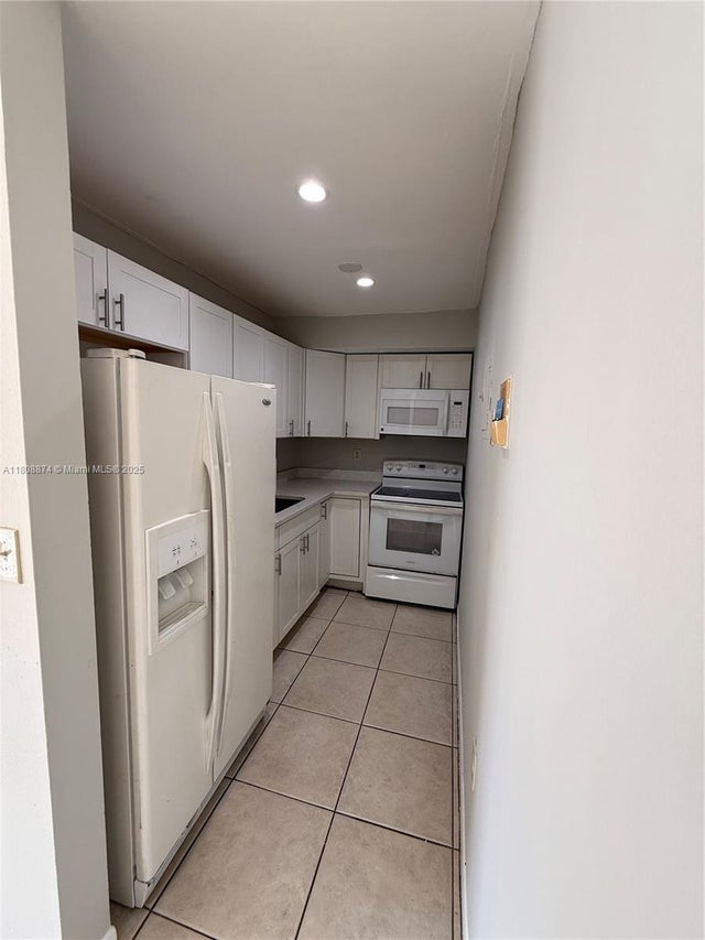 5 of 12 - 4705 Nw 7th St 203-7, Miami, FL