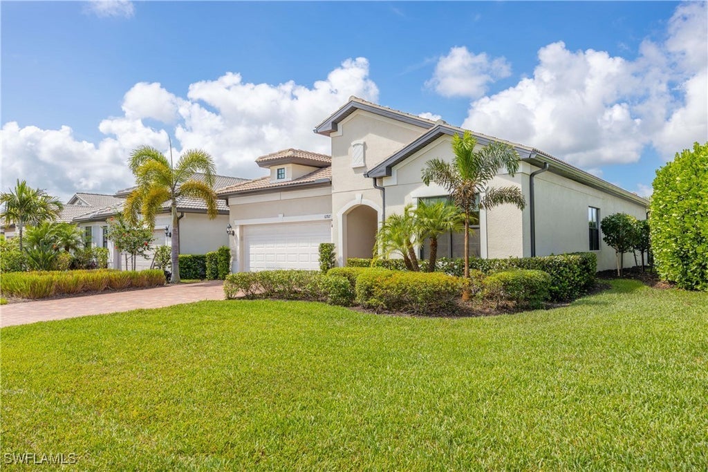 6787 Winding Cypress Dr, Naples