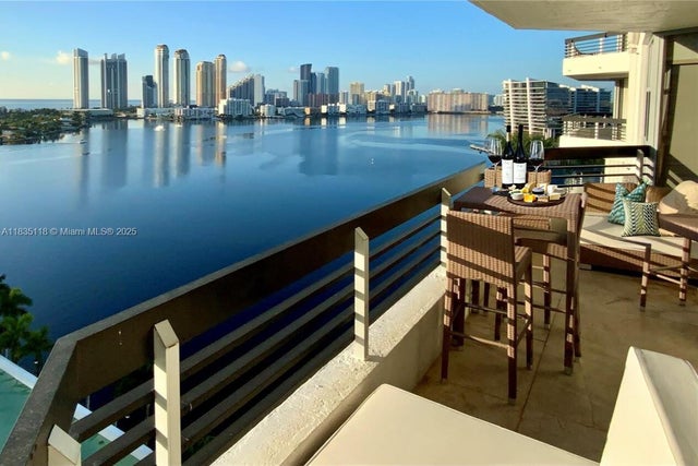 1 of 60 - 3530 Mystic Pointe Dr 1714, Aventura, FL