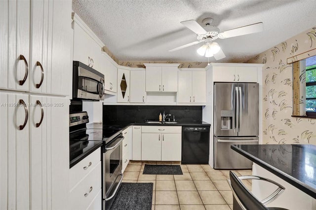 1 of 44 - 4965 E Sabal Palm Blvd 207, Tamarac, FL