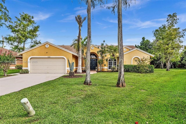 2 of 70 - 104 Oxford Ct, Royal Palm Beach, FL