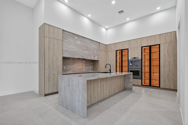 2 of 77 - 3303 W Stonebrook Cir, Davie, FL