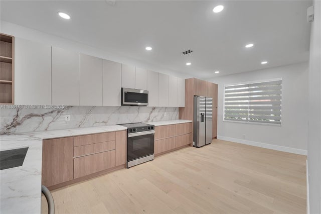 2 of 60 - 704 Stanton Dr, Weston, FL