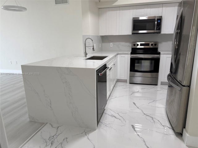 1 of 33 - 888 S Douglas Rd 1502, Coral Gables, FL