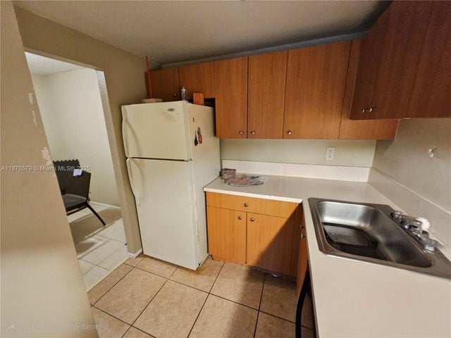 4 of 47 - 411 Executive Center Dr 209, West Palm Beach, FL