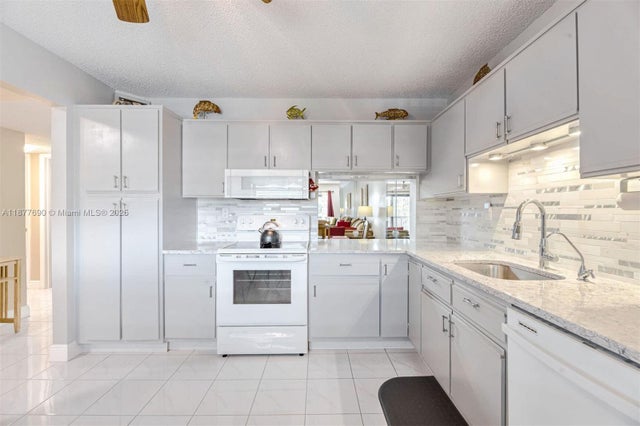 1 of 30 - 4955 E Sabal Palm Blvd 305, Tamarac, FL