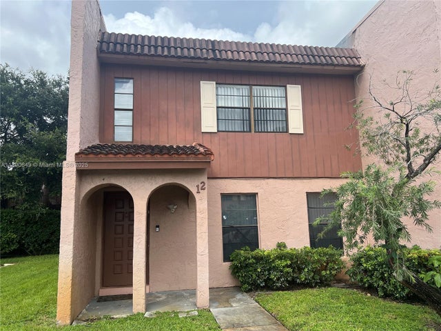 1 of 27 - 12 Madrid Ln 1-18, Davie, FL