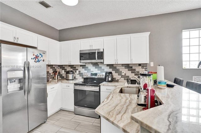 5 of 12 - 4824 Nw 19th St, Coconut Creek, FL