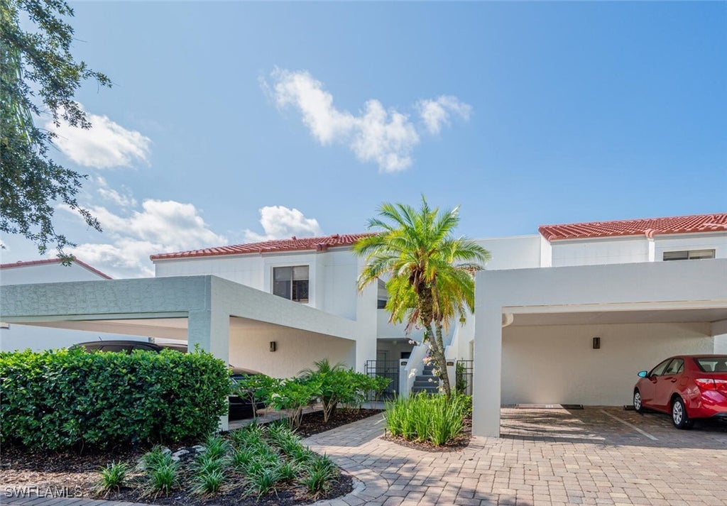 577 Beachwalk Cir R-203, Naples