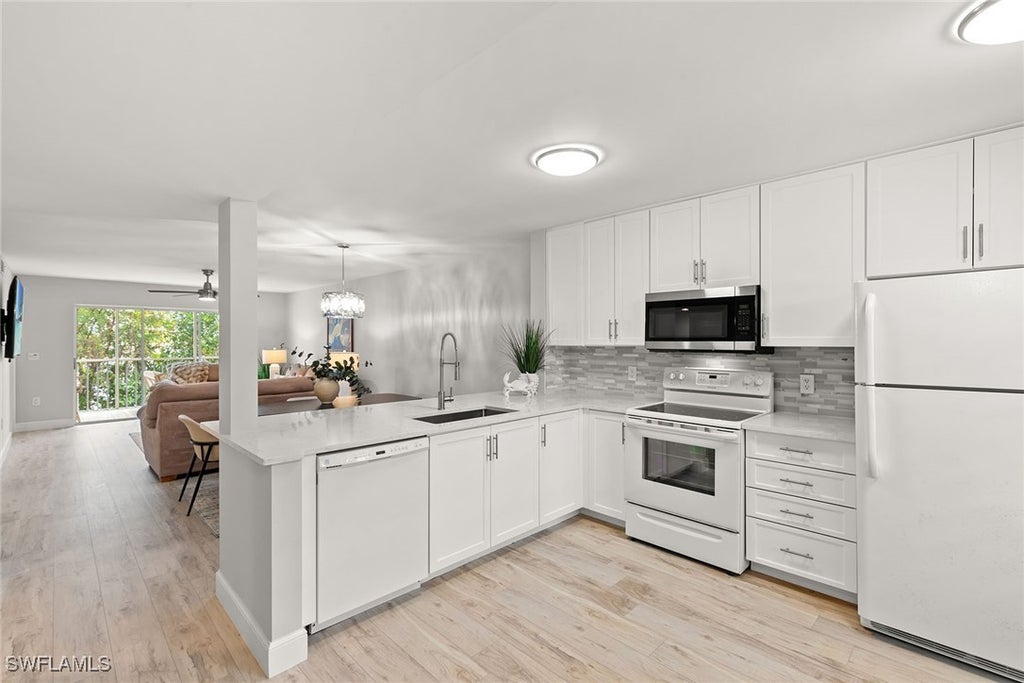 3071 Sandpiper Bay Cir L205, Naples