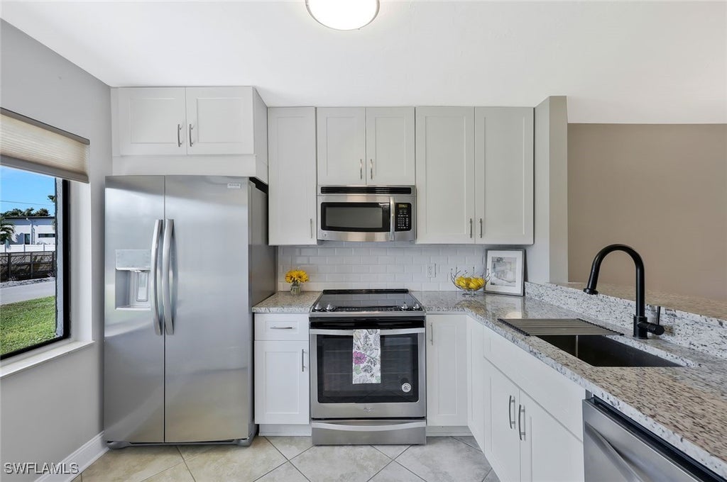 1211 Rosemary Ct Unit C104, Naples