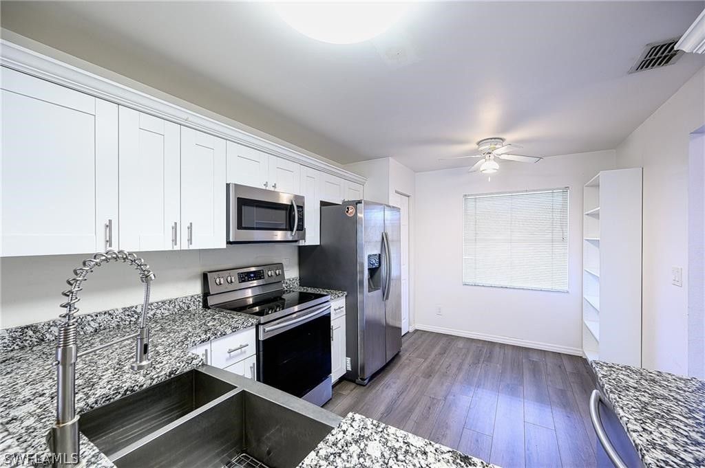 1476 Churchill Cir J-202, Naples