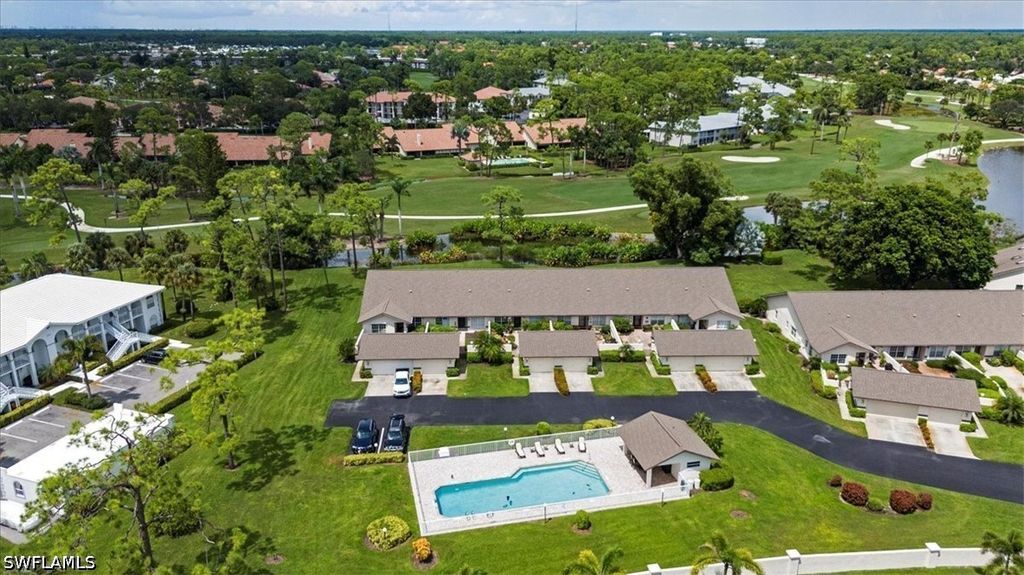 245 Deerwood Cir 12-8, Naples