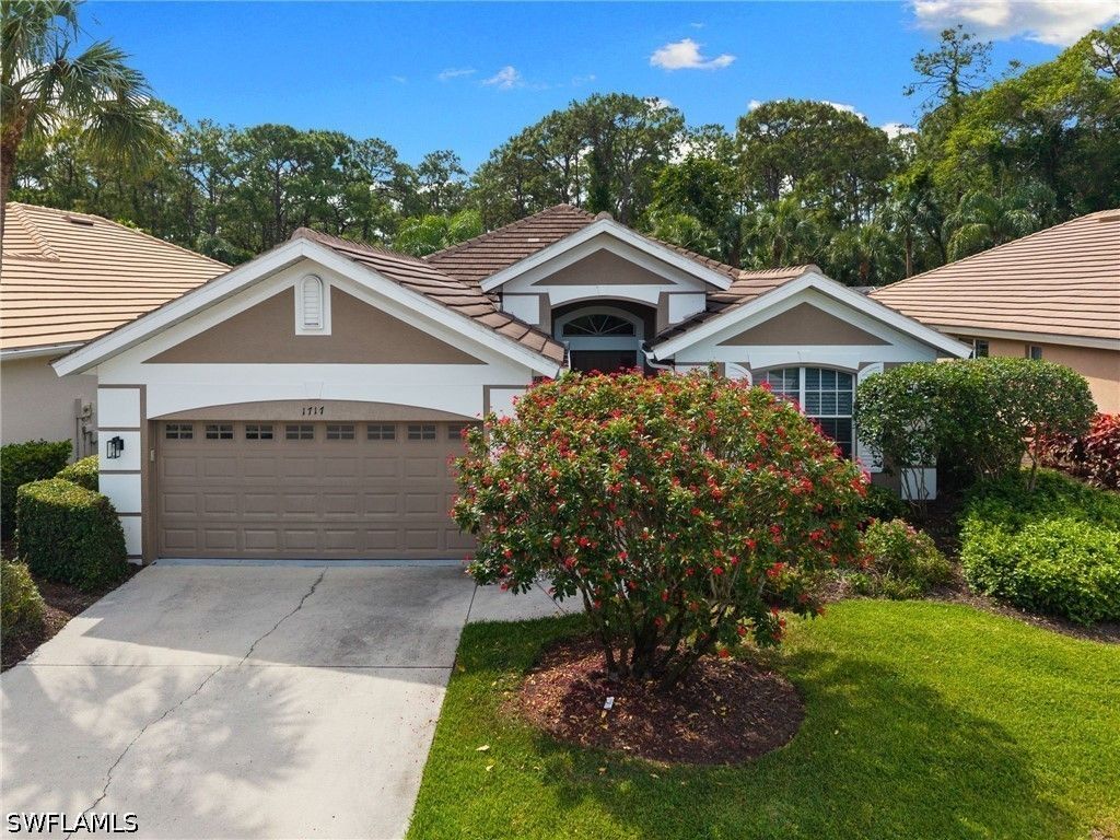 1717 Winding Oaks Way, Naples