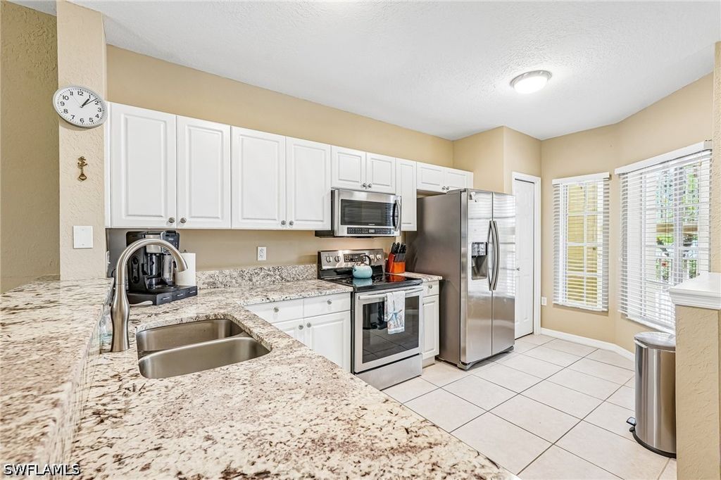 9185 Celeste Dr 1-103, Naples