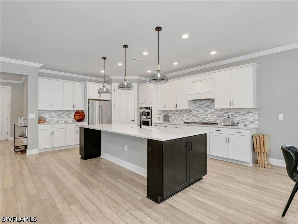 9487 Greyhawk Trl, Naples