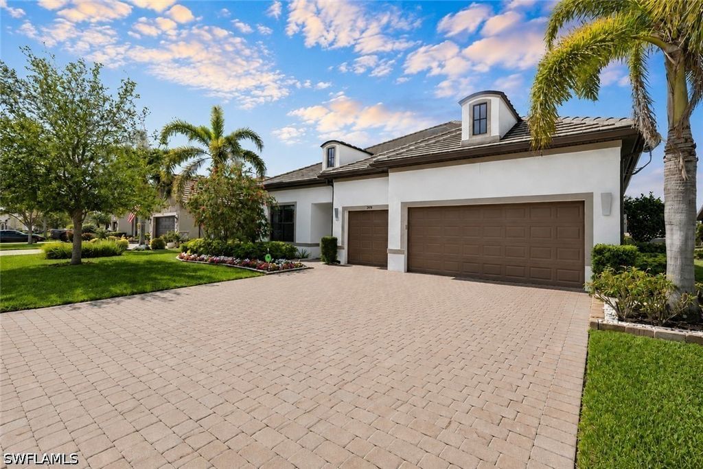 7478 Winding Cypress Dr, Naples