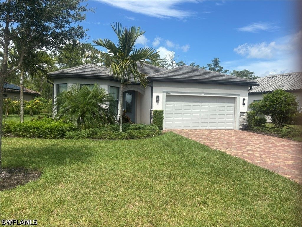 6820 Winding Cypress Dr, Naples