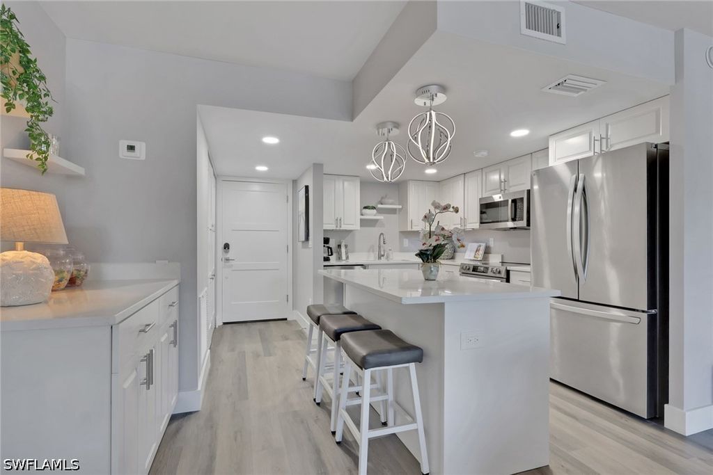 3 Bluebill Ave 107, Naples