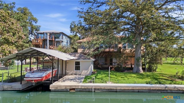 MLS #627806 for Sale at 124 Lakeside Drive, on  in the city of Seguin, 78155
